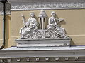 Filosofia e medicina representadas na fachada da Biblioteca Nacional da Finlndia, esculpidas por Carl Magnus Mellgren (1806 - 1886). As figuras representam duas das quatro faculdades da Universidade de Helsinki. <br><br> Palavras-chave: Mellgren, arte, faculdade, medicina, escultura, filosofia